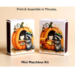 May include: Two mini matchbox kits featuring a raccoon wearing a green beret, standing by a pumpkin-shaped post office with a lantern. The text reads Print & Assemble in Minutes and Mini Matchbox Kit. The design includes envelopes and mail.