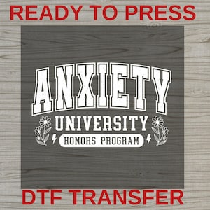 May include: A white graphic design on a dark gray background featuring the text ANXIETY UNIVERSITY HONORS PROGRAM in a collegiate font. The design includes two small floral illustrations on the sides and two lightning bolt icons.