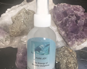 La alegría de los delfines dichosos. 2 onzas líquidas de Frecuencias de alegría de los delfines salvajes en una botella de vidrio esmerilado.