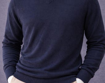 Jersey de lana merino extrafina con cuello en V azul marino para hombre de Calvin Klein, talla M, nuevo con etiquetas.