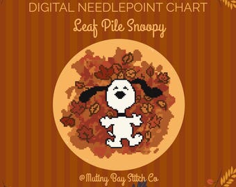 May include: A digital needlepoint chart titled Leaf Pile Snoopy featuring a pixel art illustration of a white dog with black ears sitting in a pile of autumn leaves. The design is set against a circular light orange background with brown stripes.