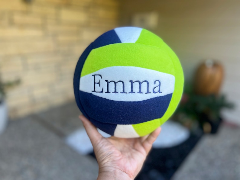 Personalized tricolor volleyball made from soft fleece plush fabric.