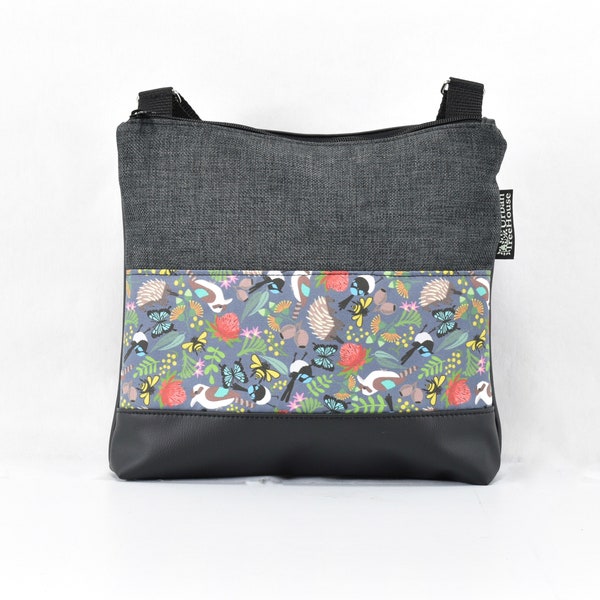 Cross body bag. Charcoal upholstery fabric, black PU faux leather, featuring my ‘Spring fling’ fabric. Crossbody Vegan bag