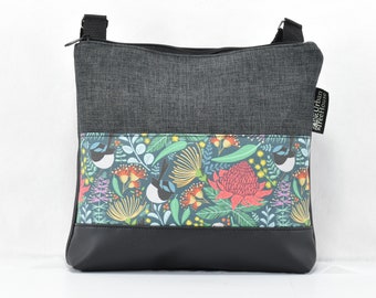 Cross body bag. Charcoal upholstery fabric, black PU faux leather, featuring my ‘Waratah garden’ fabric. Crossbody Vegan bag