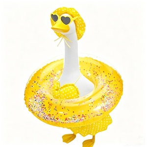 May include: A whimsical goose figurine wearing heart-shaped sunglasses, a polka-dot sun hat, and a yellow polka-dot bikini. The goose is floating in a yellow inflatable ring with glitter accents. The figurine has yellow webbed feet.
