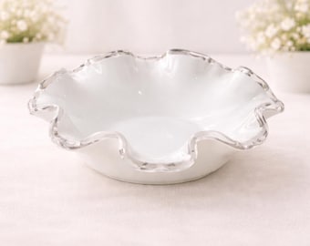 Vintage Fenton Silver Crest white milk glass candy dish featuring a ruffled, scalloped edge.