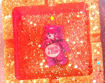 Glow in the dark swear Bear ashtray featuring “your a cunt “ Bear.