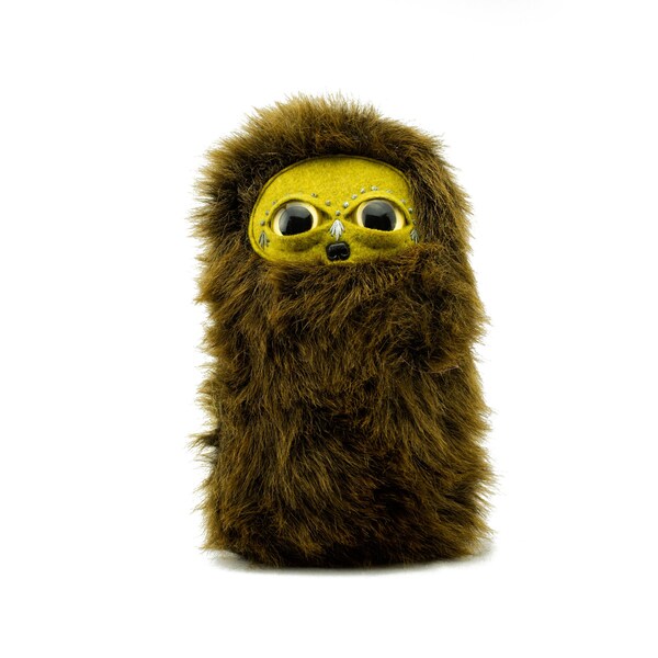 Brown Menacing Squinty Nugget Cool Critter