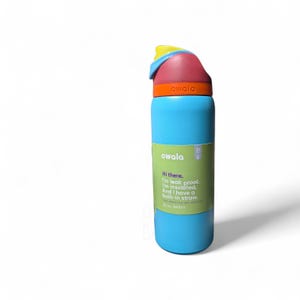 May include: A light blue insulated water bottle with a multi-colored lid featuring yellow, red, and orange accents. A green label on the front displays the text: Hi there. I'm leak proof. I'm insulated. And I have a built-in straw. 32 oz / 945ml.