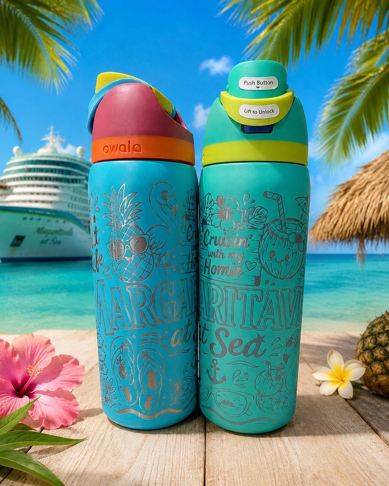 May include: Two turquoise Owala water bottles with laser-engraved tropical designs. The left bottle features a pineapple, flamingo, and the text Margaritaville at Sea. The right bottle displays a coconut, hibiscus, and Cruisin with my Homie.