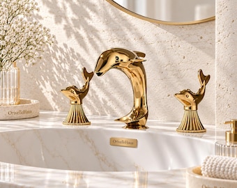 Dolphin style gold 3 hole bathroom sink taps