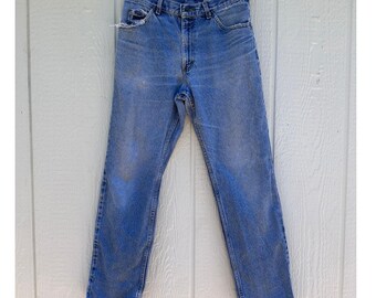 Jeans Lee vintage de los 90, desgastados, lavado claro.