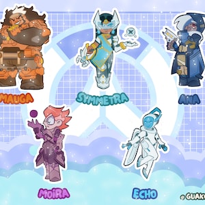 May include: A sticker sheet featuring five stylized cartoon characters: Mauga in orange armor, Symmetra in blue and gold, Ana in a blue cloak, Moira in purple, and Echo in white. Each character is labeled with their name below in colorful text.
