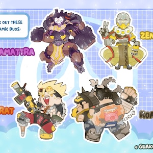 Puede incluir: Un conjunto de cuatro pegatinas de personajes con Ramattra, Zenyatta, Junkrat y Roadhog. El texto dice "CHECK OUT THESE DYNAMIC DUOS!", "RAMATTRA", "ZENYATTA", "JUNKRAT", "ROADHOG" y "@GUAKOCHARMS". Los personajes est&aacute;n ilustrados en estilo cartoon.
