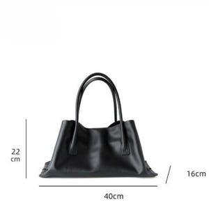 May include: A black tote bag with two handles. The bag is rectangular, with a width of 40 cm, a height of 22 cm, and a depth of 16 cm. The bag is made of a smooth material and has a simple, elegant design.