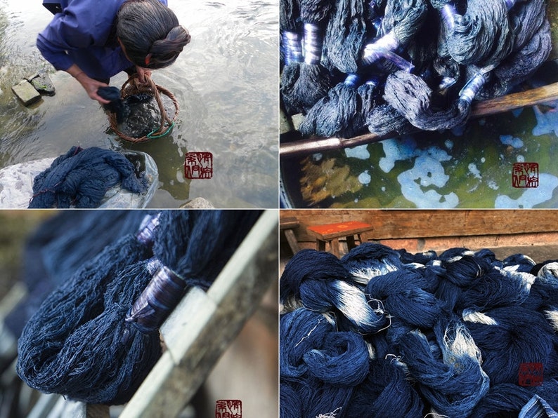 May include: A close-up of indigo blue yarn being dyed in a natural dye bath. The yarn is being rinsed in a river and then hung to dry. The yarn is a deep indigo blue color.