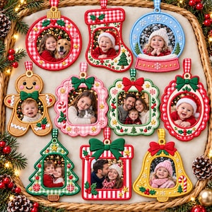 May include: A collection of ten embroidered fabric Christmas ornaments in various shapes including a stocking, snow globe, gingerbread person, tree, bell, and frames, each featuring a unique photo of people or pets inside.