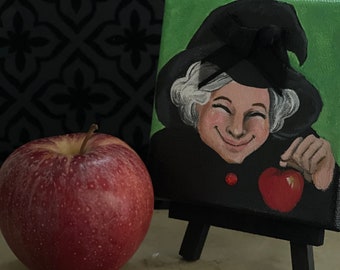 Painting of a Halloween witch holding an apple - Tiny canvas with wood easel- Home decor - Halloween Decor - Gift idea  - Original painting