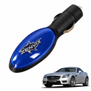 May include: A black and blue car charger featuring a shark graphic and the text ZENVIX on the blue oval face. The charger has a standard plug end for a vehicle power outlet. A silver Mercedes-Benz AMG car is shown in the lower right corner.