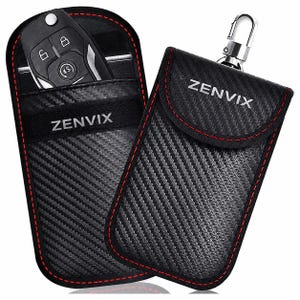 May include: Two black carbon fiber textured key fob pouches with red stitching and the brand name ZENVIX printed in white. One pouch is open showing a black car key fob inside, while the other is closed and features a silver metal carabiner clip.