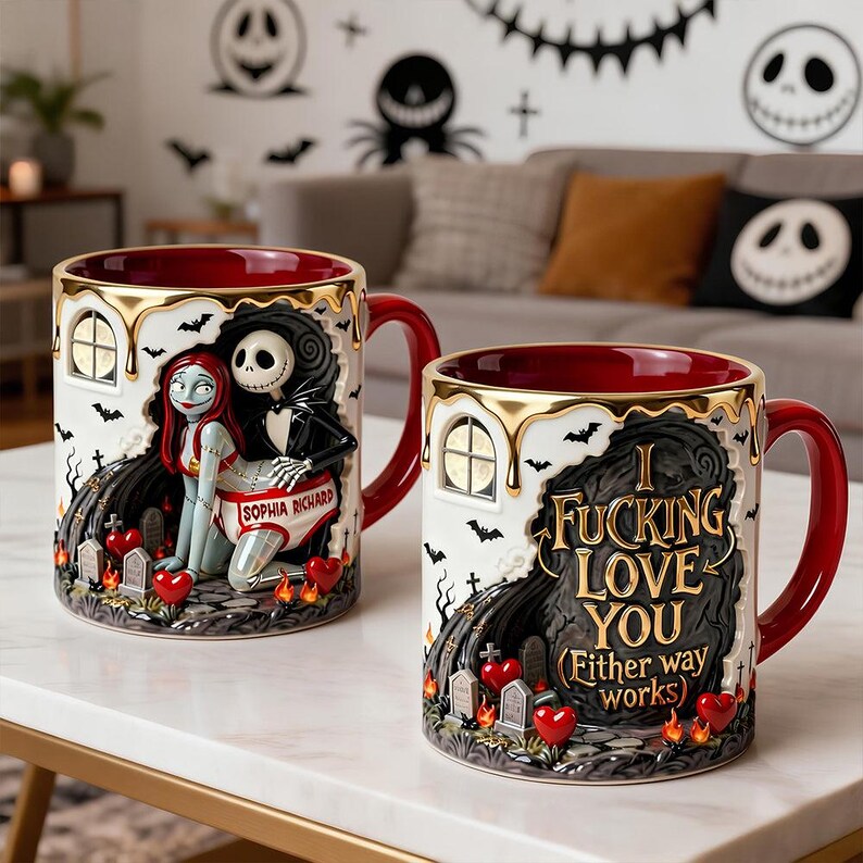 May include: Two ceramic mugs with red interiors and handles. One mug features Jack and Sally from The Nightmare Before Christmas, the other says "I Fucking Love You." Both mugs have gold trim and a graveyard design.