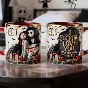 May include: Two ceramic mugs with red handles and rims. One mug features Sally and Jack Skellington, the other has the text "I Fucking Love You". Both mugs have gold accents, black bats, and heart-shaped details.
