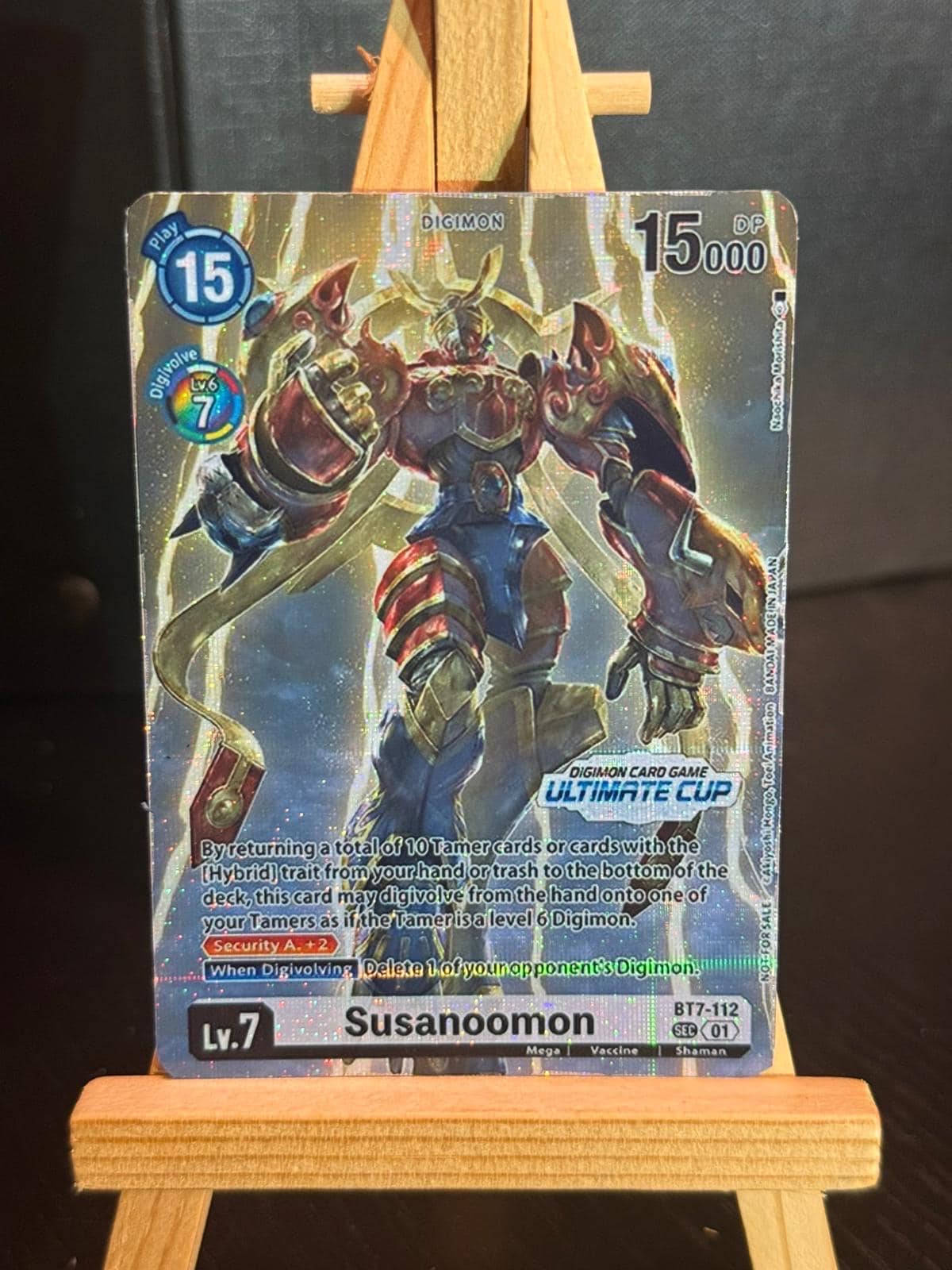 digimon card game susanoomon - Wikimon You may digivolve this card from your hand onto one of your Tamers as if the Tamer is a level 6 Digimon by placing 10 Tamer cards and/or cards with [Hybrid] in their traits from your hand and/or trash at the bottom of your deck in any order Card Susanoomon ACE SEC Parallel
