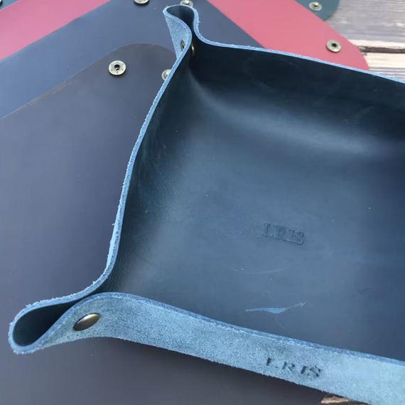 Full-grain leather catchall, hand-cut and stamped with a custom name or monogram — the kind of desk/entryway piece that looks like it cost three times as much.