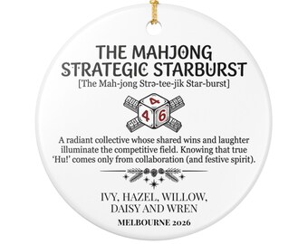 May include: A round white ceramic ornament featuring black text that reads THE MAHJONG STRATEGIC STARBURST, a graphic of a die with the numbers 4 and 6, and the names IVY, HAZEL, WILLOW, DAISY AND WREN with the location and year MELBOURNE 2026.