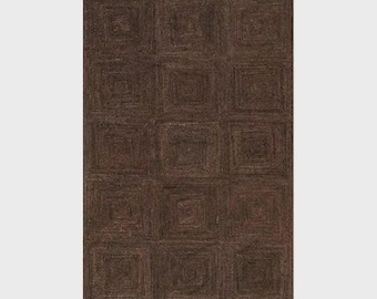 May include: A rectangular area rug in a deep dark brown color featuring a repeating grid pattern of concentric squares. The surface has a textured, woven appearance with visible fiber details throughout the entire construction of the floor covering.