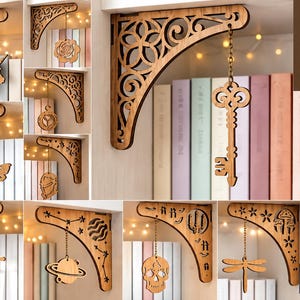 May include: A collection of ten laser-cut wooden shelf brackets featuring intricate decorative patterns and hanging ornaments. The designs include a unicorn, rose, key, moth, sword, planet, skull, and dragonfly. Text reads 10 DESIGN LASER CUT READY FILES CDR PNG SVG PDF EPS DFX MATERIA WIDTH 3MM.
