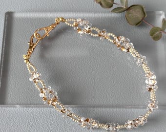 Correa de muñeca para teléfono con cuentas de cristal transparente | Diseño de círculo floral | Colgante minimalista para teléfono | Cordón de mano | Oro o plata