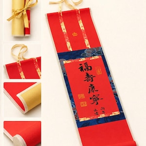 Personalized mini Chinese calligraphy scroll shown open and rolled with red paper, brocade trim, ribbon, and wooden ends
