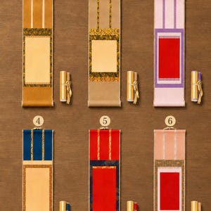 Six mini Chinese calligraphy scroll style options numbered 1 to 6, showing different brocade colors and blank red or cream writing panels for buyer selection.