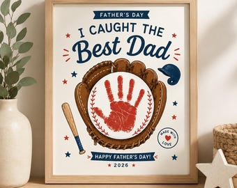May include: A framed print featuring the text FATHER'S DAY, I CAUGHT THE BEST DAD, and HAPPY FATHER'S DAY! 2026. The design includes a brown baseball glove, a baseball with a red handprint, a bat, a blue helmet, and red and blue stars.