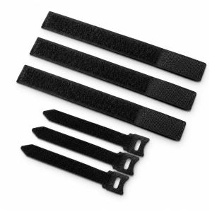 May include: A collection of black hook and loop cable ties, arranged on a white background. The ties are rectangular, with a textured hook-and-loop surface on one side and a smooth, woven material on the other. Some have a loop end.