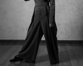 Wide leg overall with  stripe patterned cut out in  the back