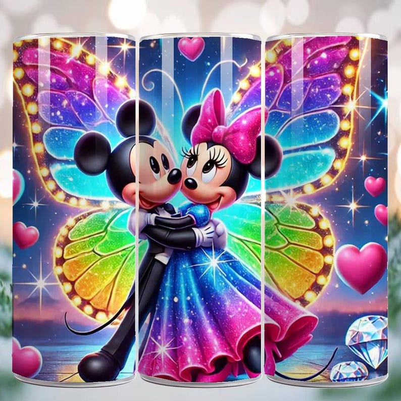 May include: A tumbler featuring Mickey and Minnie Mouse embracing, set against a backdrop of a butterfly's wings. The design incorporates a vibrant color palette of blues, pinks, and purples, with heart and diamond accents. The overall theme is romance and fantasy.