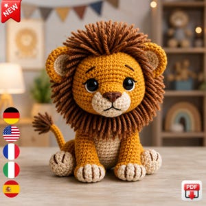 May include: A crocheted lion stuffed animal featuring a golden yellow body, a cream-colored muzzle and chest, and a thick, dark brown yarn mane. The lion has large black safety eyes, a brown embroidered nose, and a tail with a tufted end.