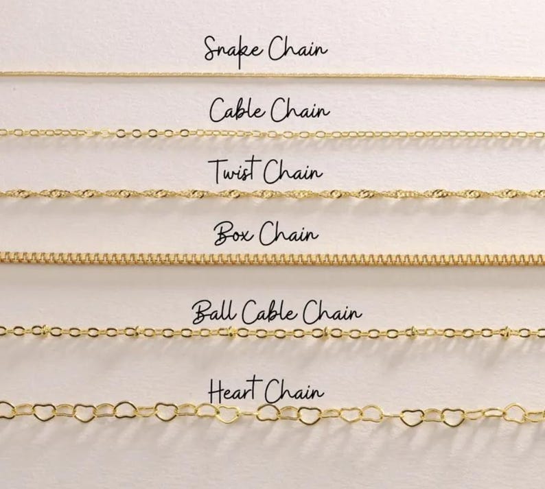May include: A selection of gold-colored chain necklaces, including Snake Chain, Cable Chain, Twist Chain, Box Chain, Ball Cable Chain, and Heart Chain. Each chain style is labeled with elegant cursive text.