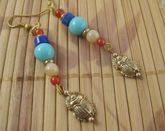 Gold scarab dangle earrings with carnelian, lapis lazuli, antique turquoise glass beads, mother of pearl and gold filled beads