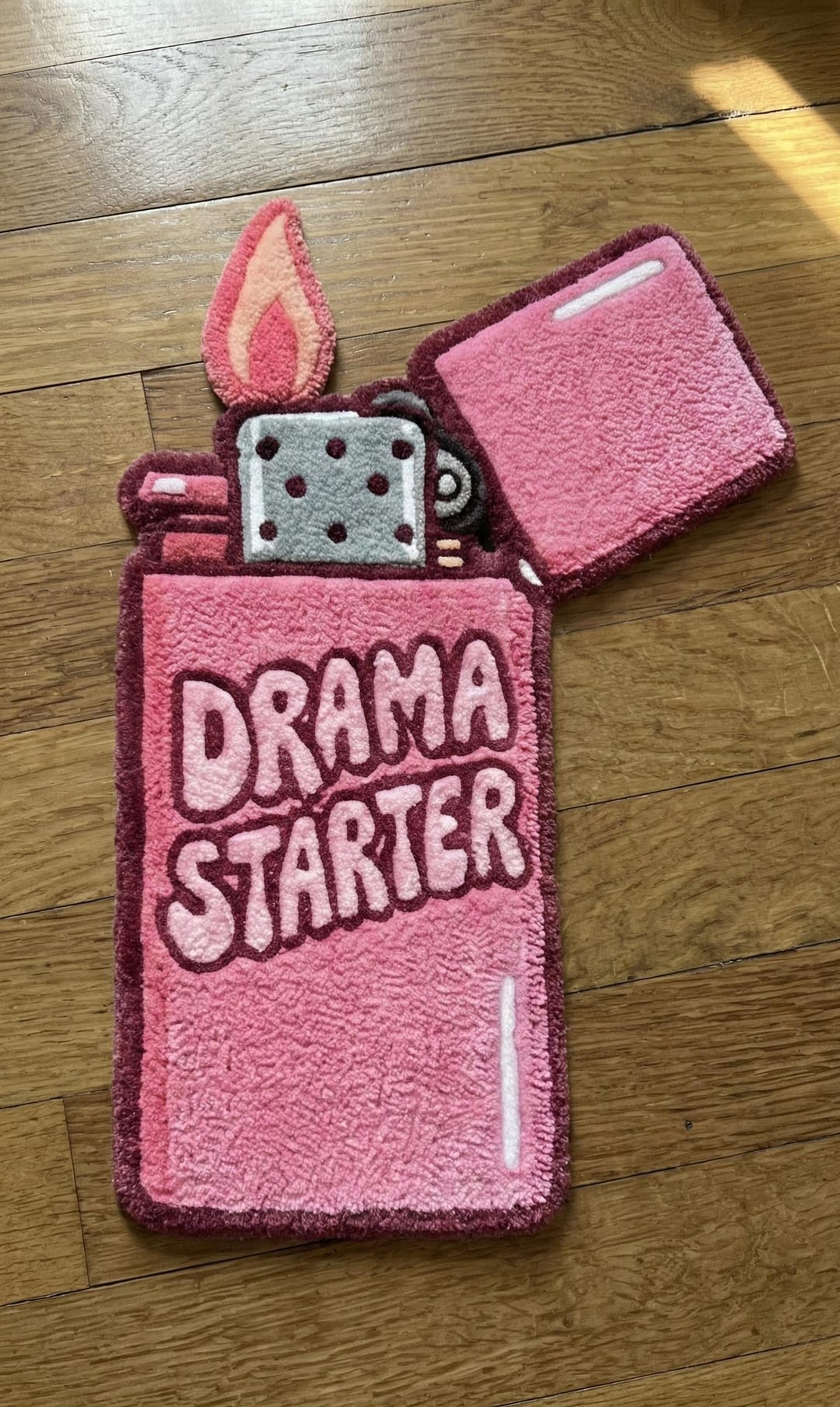 Statement Doormats Hand-tufted 'DRAMA STARTER' Statement Doormat Pink Lighter Shaped Plush ...
