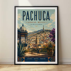 May include: A framed travel poster of Pachuca, Hidalgo, Mexico, featuring a city landscape with a clock tower, a gazebo, and mountains. The text reads PACHUCA, HIDALGO, MÉXICO, LA BELLA AIROSA, and at the bottom, HISTORIA, MINERÍA, TRADICIÓN.
