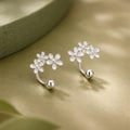 Pave CZ Daisy Flower C-Shape Earrings | 925 Sterling Silver, Hypoallergenic, Birthday Jewelry Gift product logo