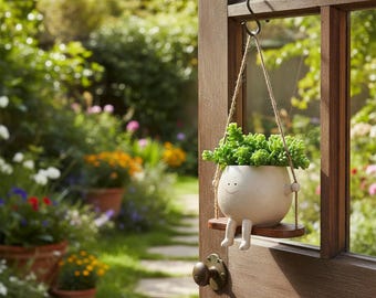 Maceta con cabeza oscilante: Maceta de pared con cara divertida para jardines interiores y exteriores.