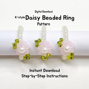 May include: Three beaded rings with daisy flower designs. Each ring features a white beaded band, a pink flower with a white center, and green beaded accents. The image includes the text "K-style Daisy Beaded Ring Pattern."