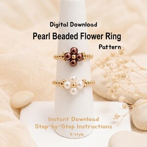 May include: Two beaded flower rings, one with brown beads and the other with white beads, displayed on a white ring holder. The rings are gold-colored. Text on the image reads "Digital Download Pearl Beaded Flower Ring Pattern Instant Download Step-by-Step Instructions K-style."