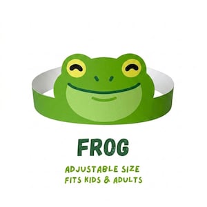 May include: A green frog-shaped paper crown with a white band. The frog face has yellow eyes and a smiling mouth. Text below reads "FROG" and "ADJUSTABLE SIZE FITS KIDS & ADULTS".