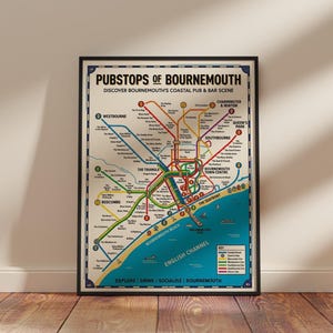 May include: A framed poster titled Pubstops of Bournemouth, featuring a colorful transit-style map of local pubs and bars. The design includes various colored lines representing routes, labeled locations, and a key for the English Channel area.