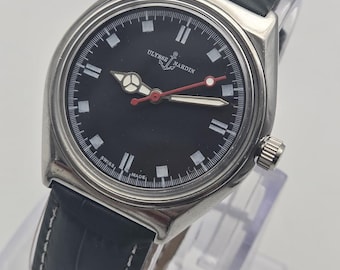 Reloj de pulsera vintage Ulysse Nardin para hombre: restaurado, de cuerda manual suiza, esfera negra clásica.